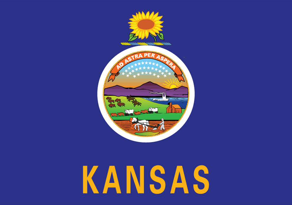 Kansas state flag featuring a sunflower and a coat of arms with agricultural imagery, symbolizing the state's heritage and commitment to growth, relevant to Kinetic Builders Corp's construction services across various industries.