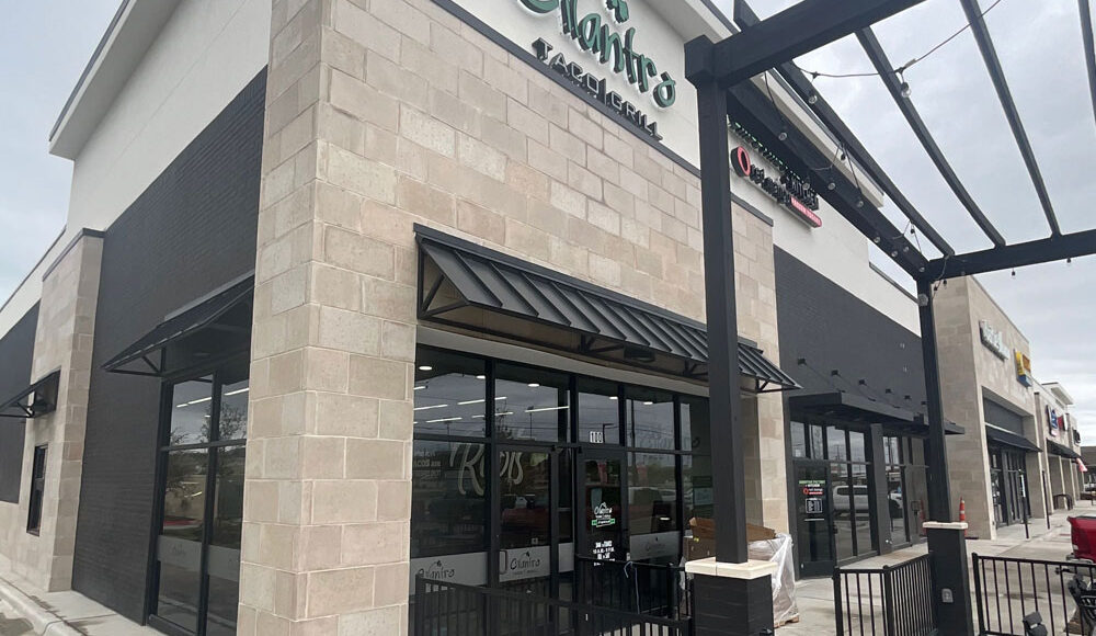 Cilantro Mexican Grill restaurant exterior showcasing modern design and signage, part of a retail complex highlighting Kinetic Builders Corp's construction projects for food industry clients.